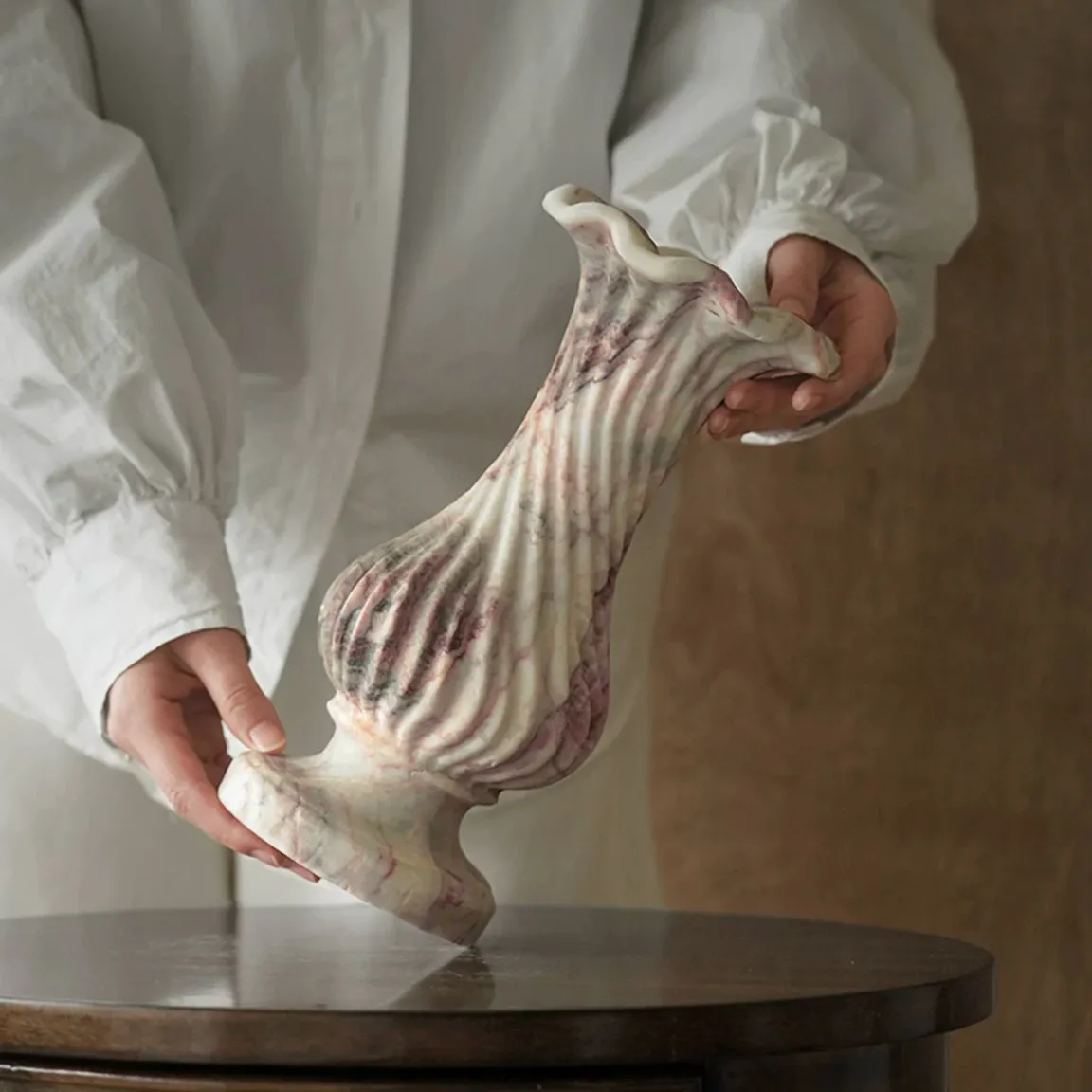 Handheld pink veined marble vase with spiral ribbed texture, oriental style stone flower vase for home decor